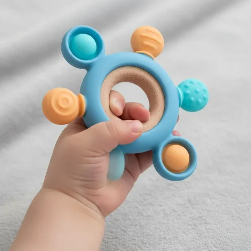 Mordillo de silicona estimulante libre BPA con aro de madera